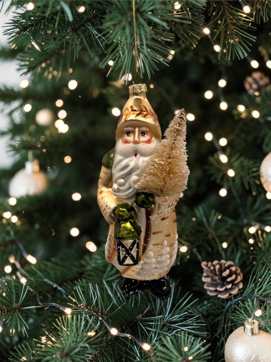 Santa Holding Sisal Tree White Ornament 7.25''