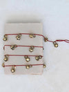 Metal Bell Garland on Red Cord